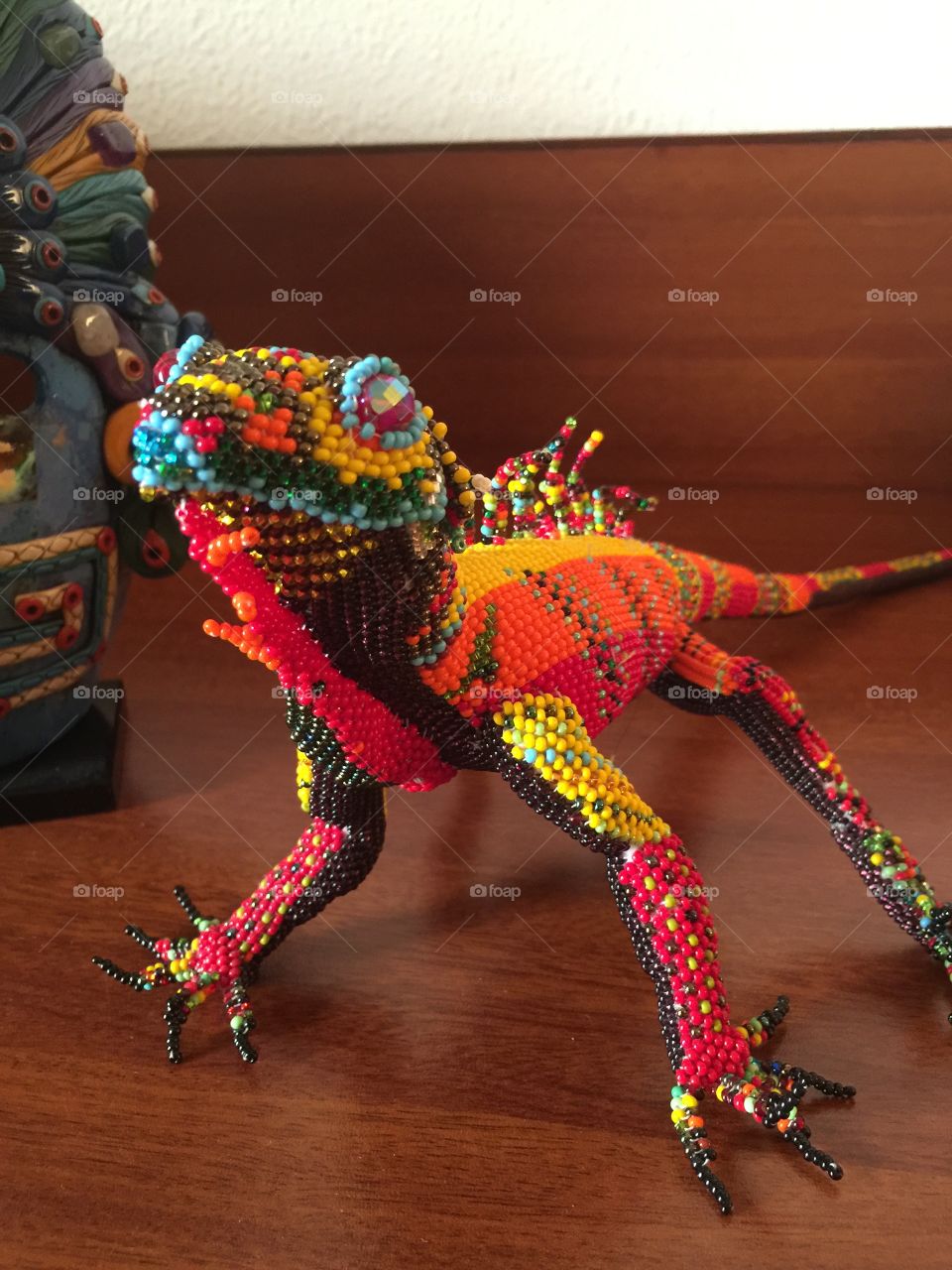 Iguana made from plastic beads from market in Antigua, Guatemala