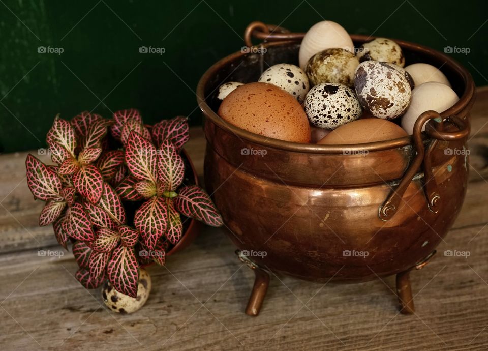 Eggs copper vase flower close-up food wood table background easter spring