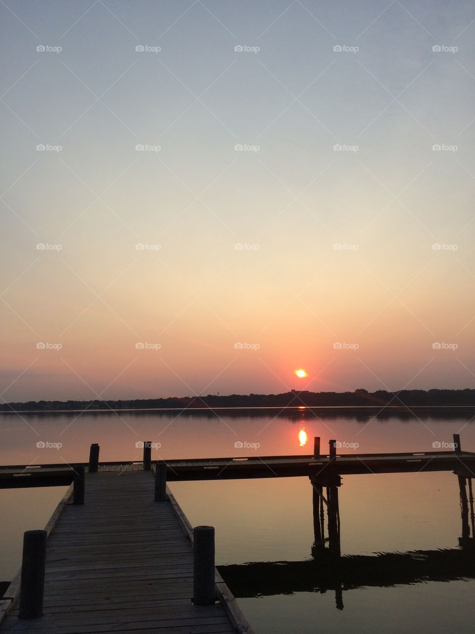 Sunrise on the dock. Lovely lake sunrise 