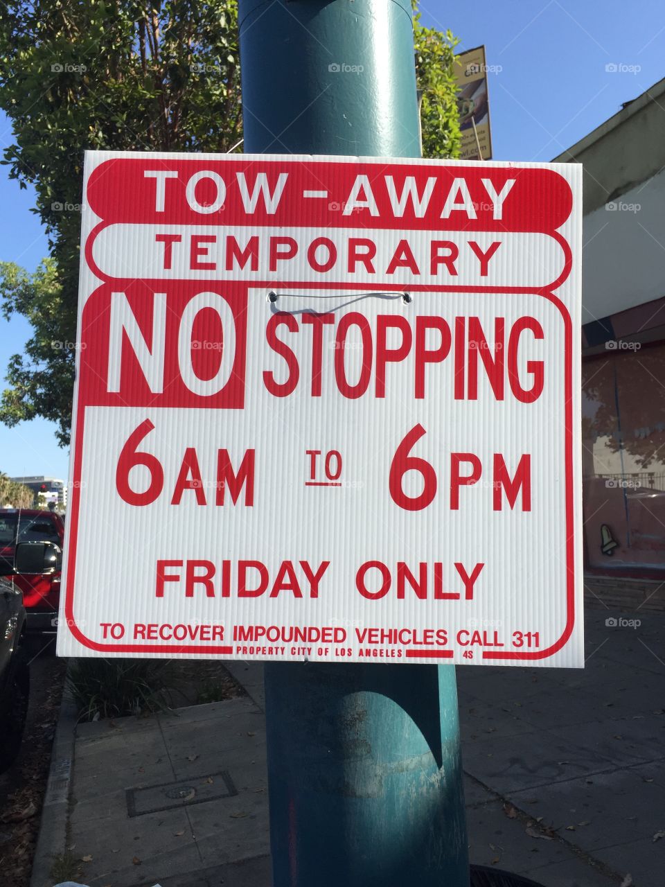 No Stopping Zone photo Tow away Zone. The sign no one reads before they tow away your car. No parking