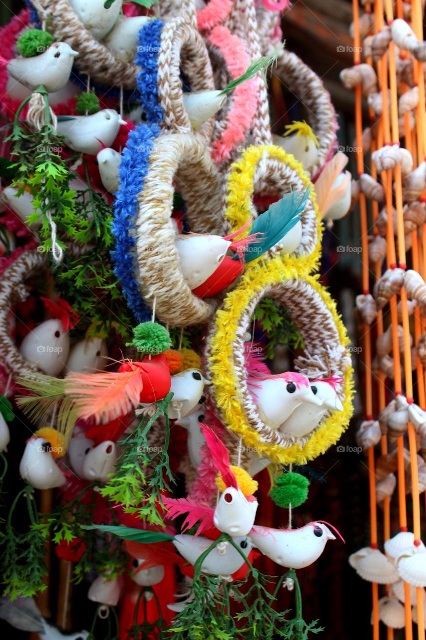colourful natural bird's hanging decorations