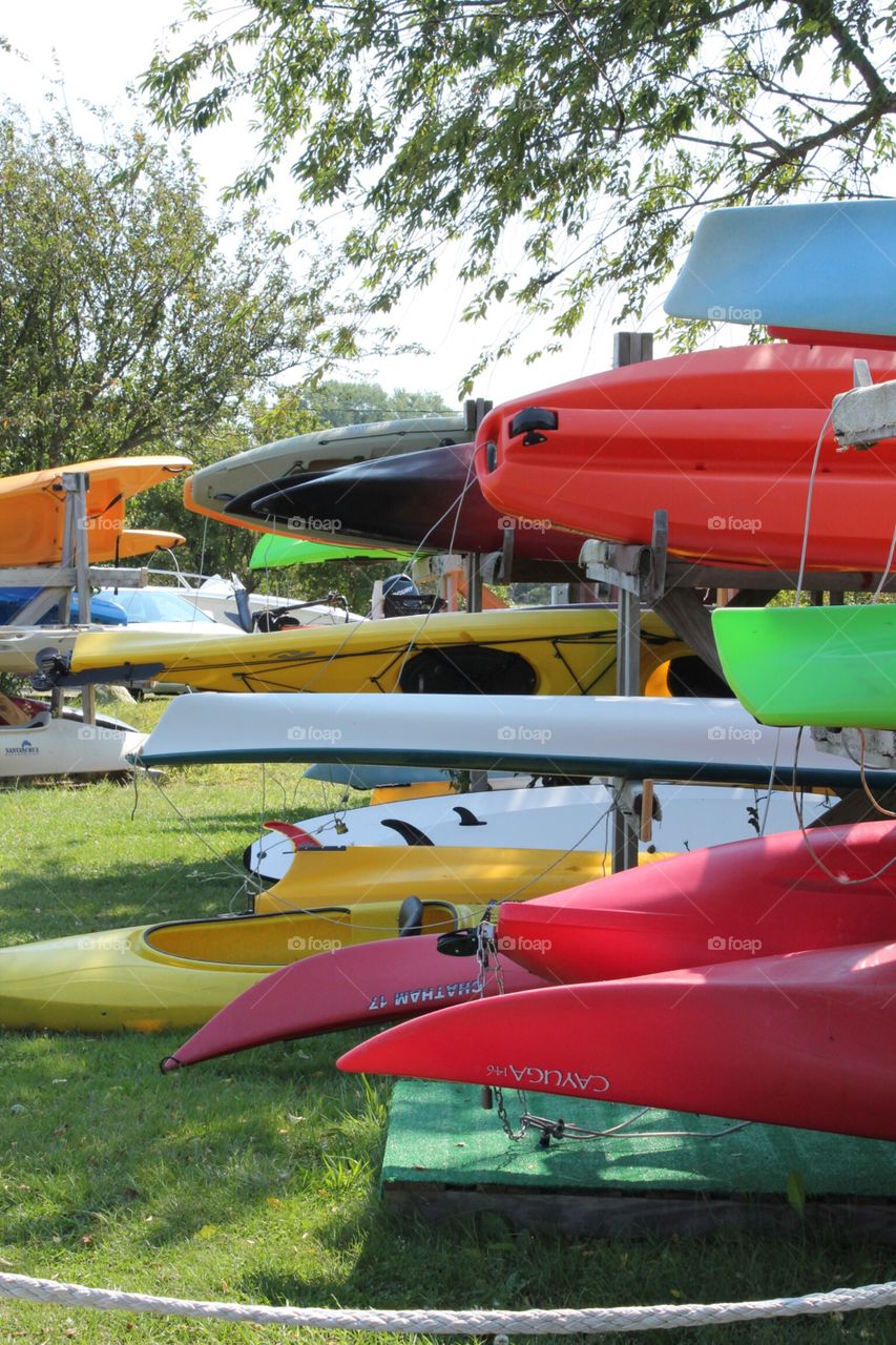 All ashore . Colorful kayaks ready to go - local colors mission 
