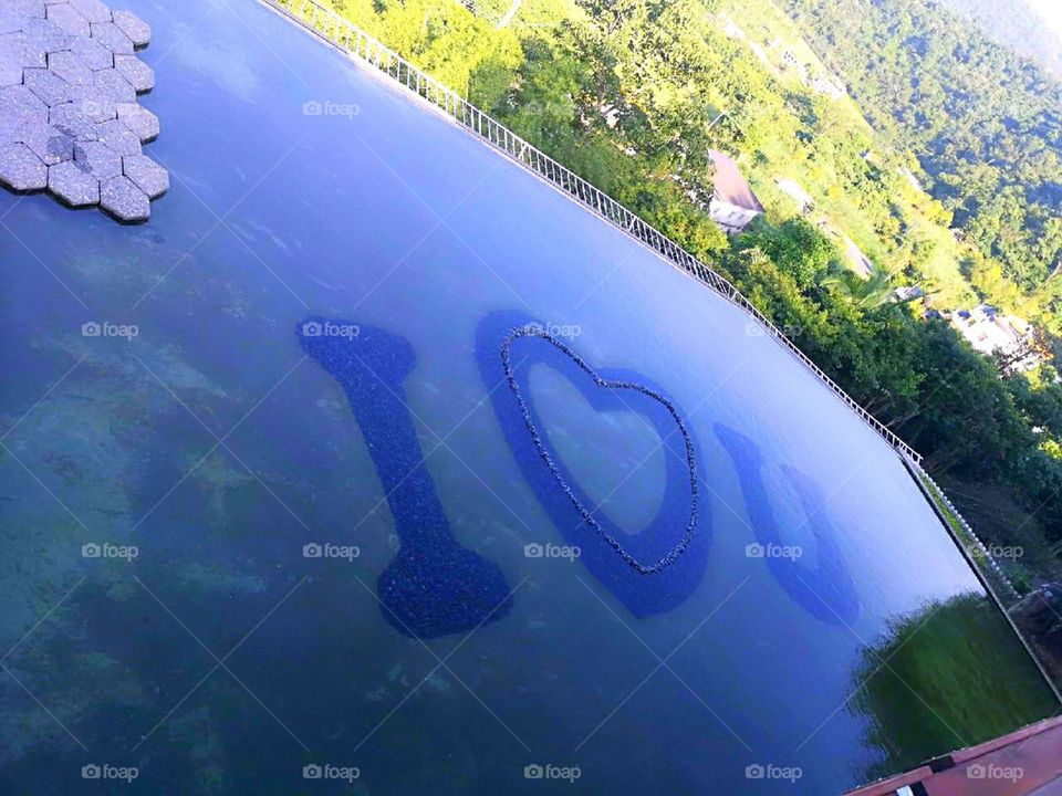 a swimming pool inthe deck that makes you love but more
