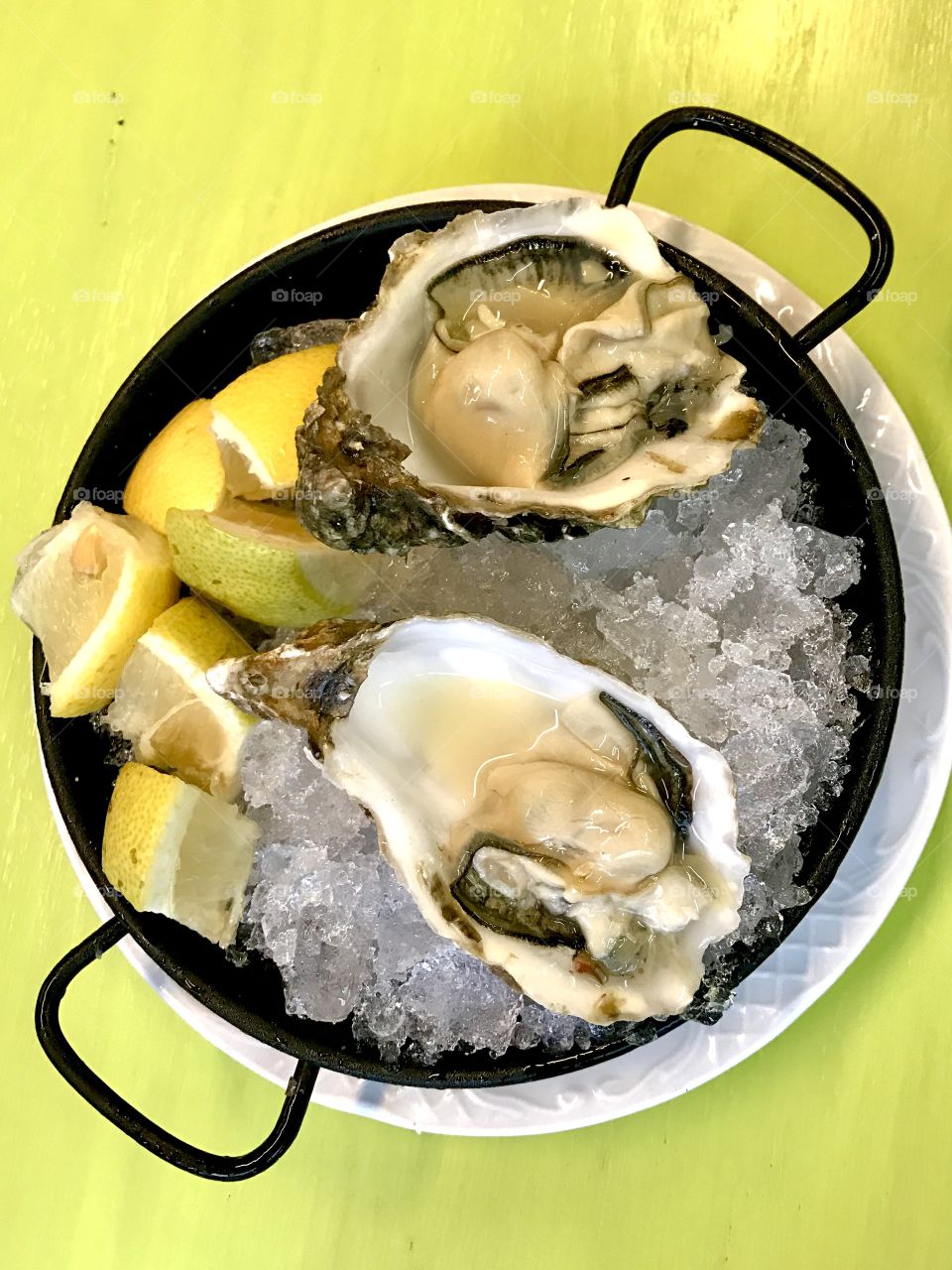A luxury breakfast - oysters with lemon on ice