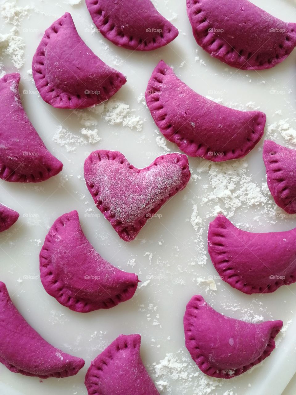 Red root beet ravioli with ricotta cheese. Flat lay