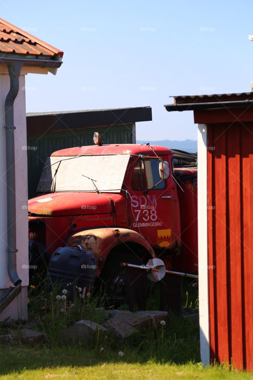 Old vintage car in the backyard 