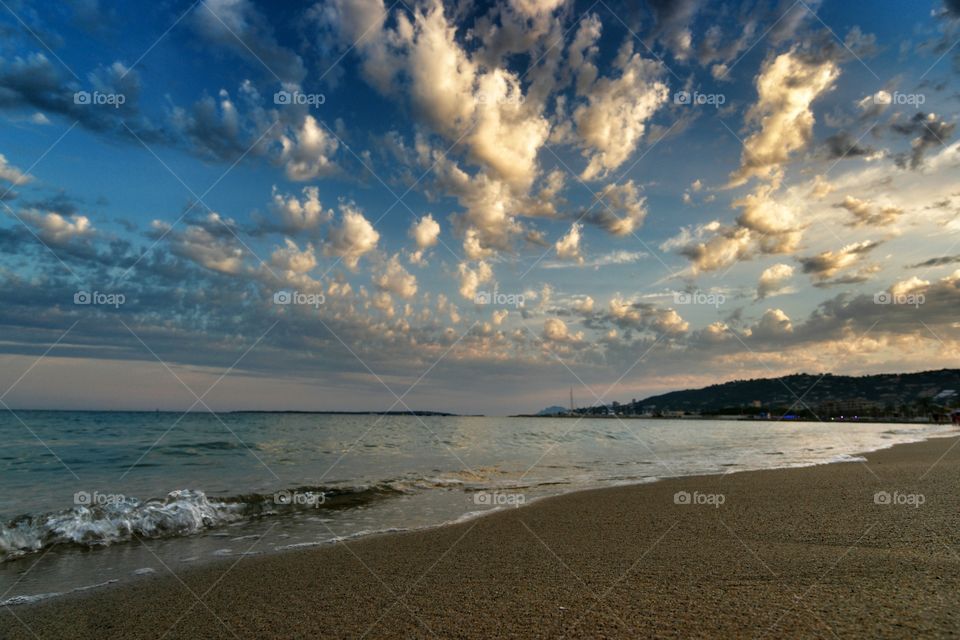 Scenic view of sea at sunset