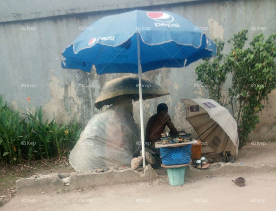 A cobbler on the Lagos Nigeria street