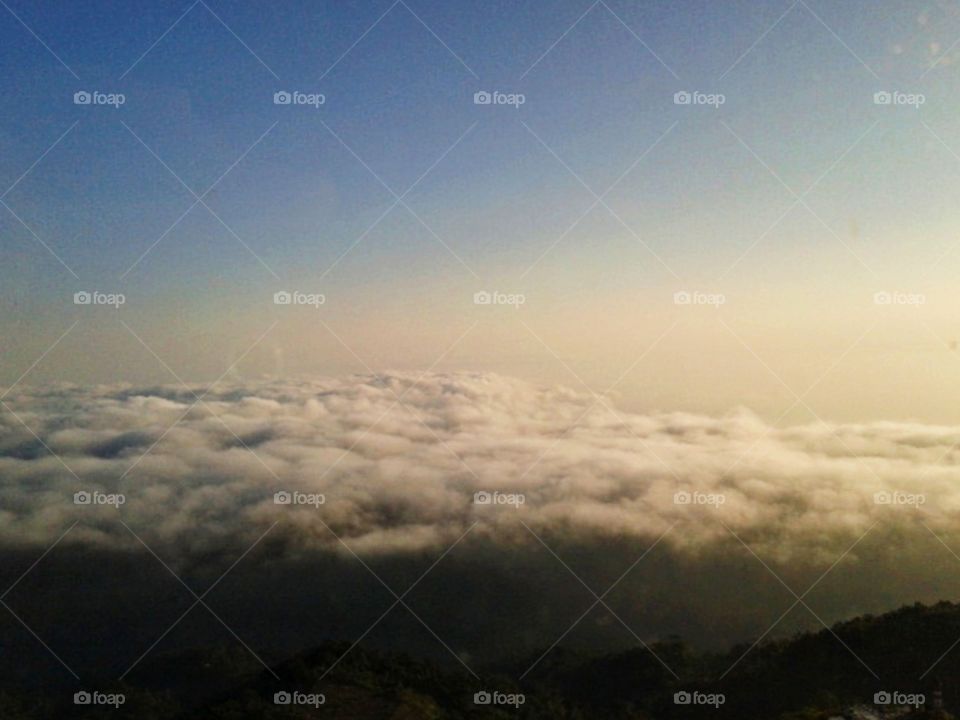 The different weather between the clouds. -- Raining day