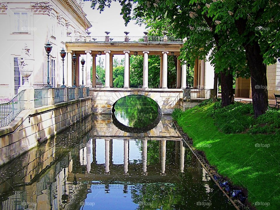 Lazienski Royal Residence Park and palace: A beautiful reflecting pool in the gardens at the palace where I took my American college students on a study abroad tour of Poland