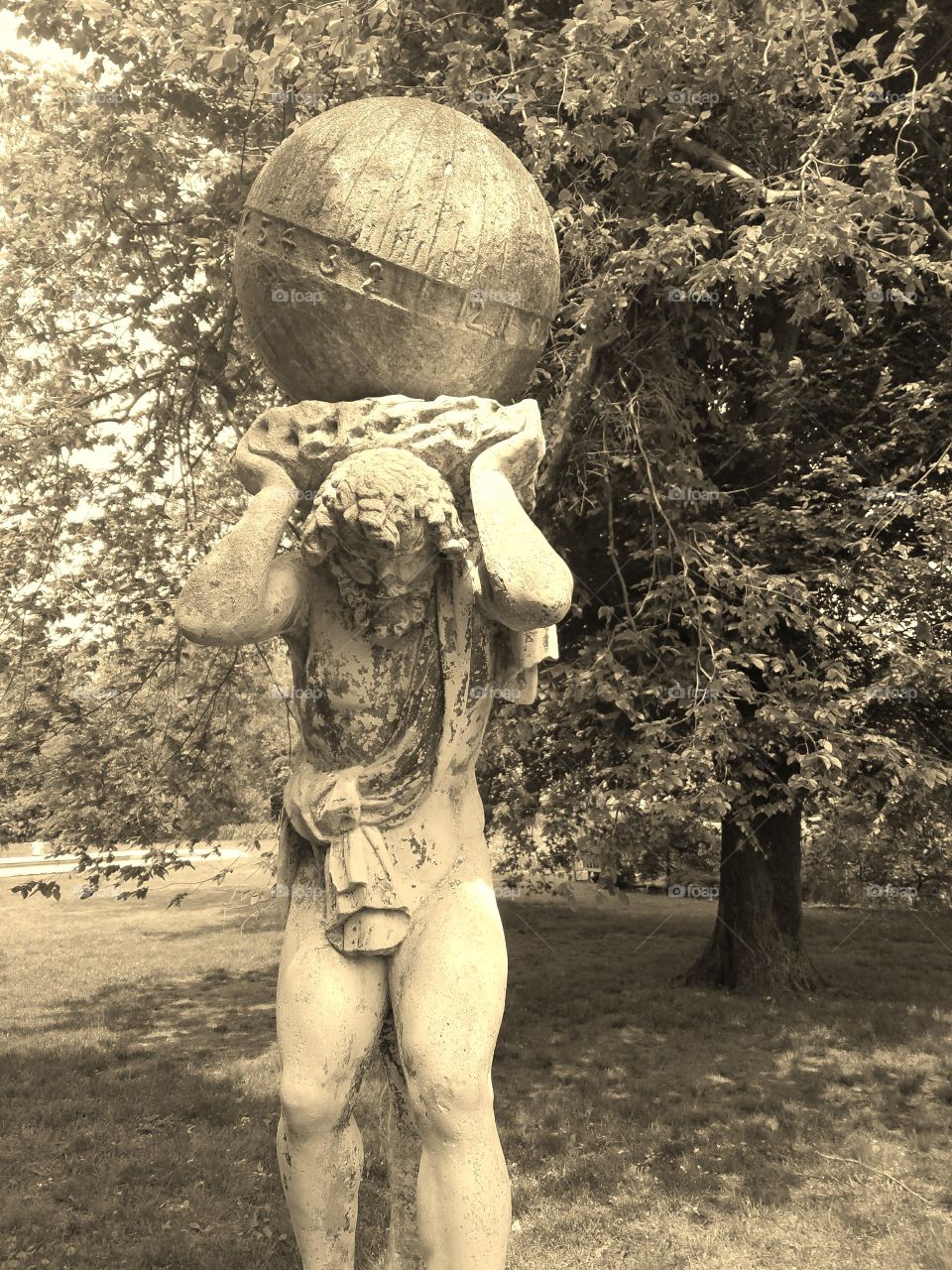 Beginning of Summer at Old Westbury Gardens on Long Island. Mix of Clouds and Sun. Sepia Filter. Sculpture Captured on Android Phone - Galaxy S7. May 2017.