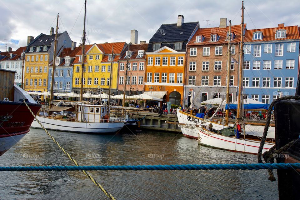 Some of the anchored ships in beautiful Nyhavn of Copenhagen 