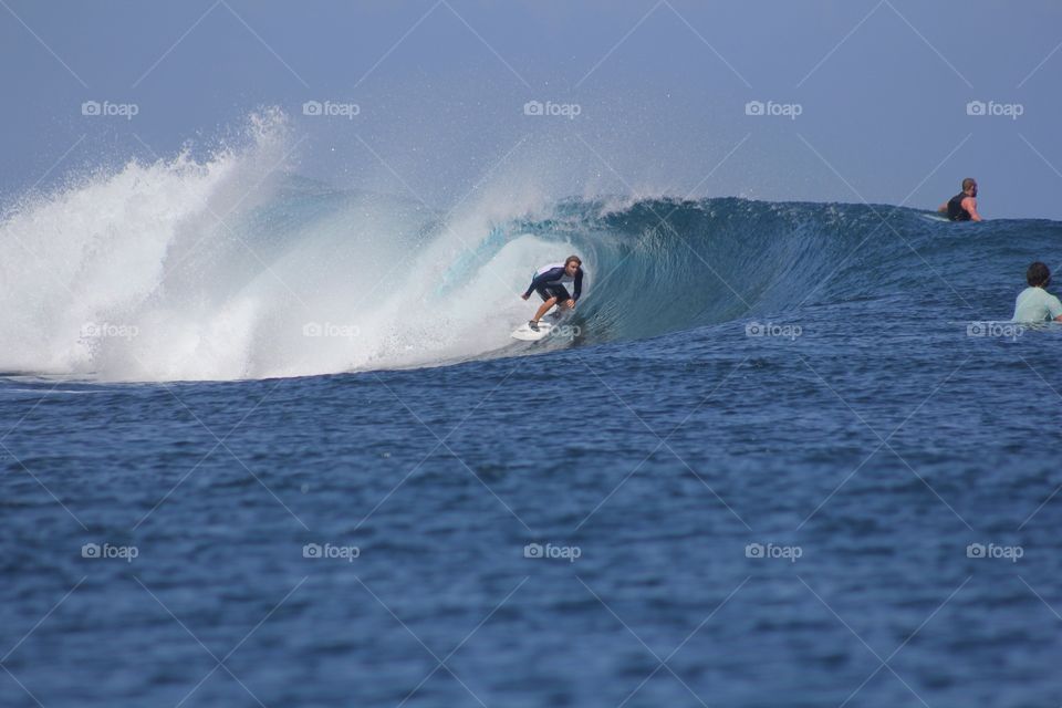 Get barreled surfing