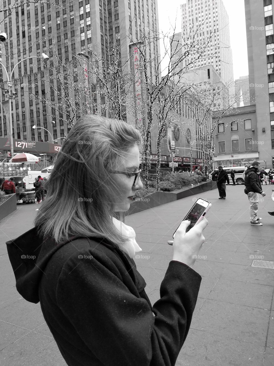 Close-up of a woman using mobile phone, New York, Usa
