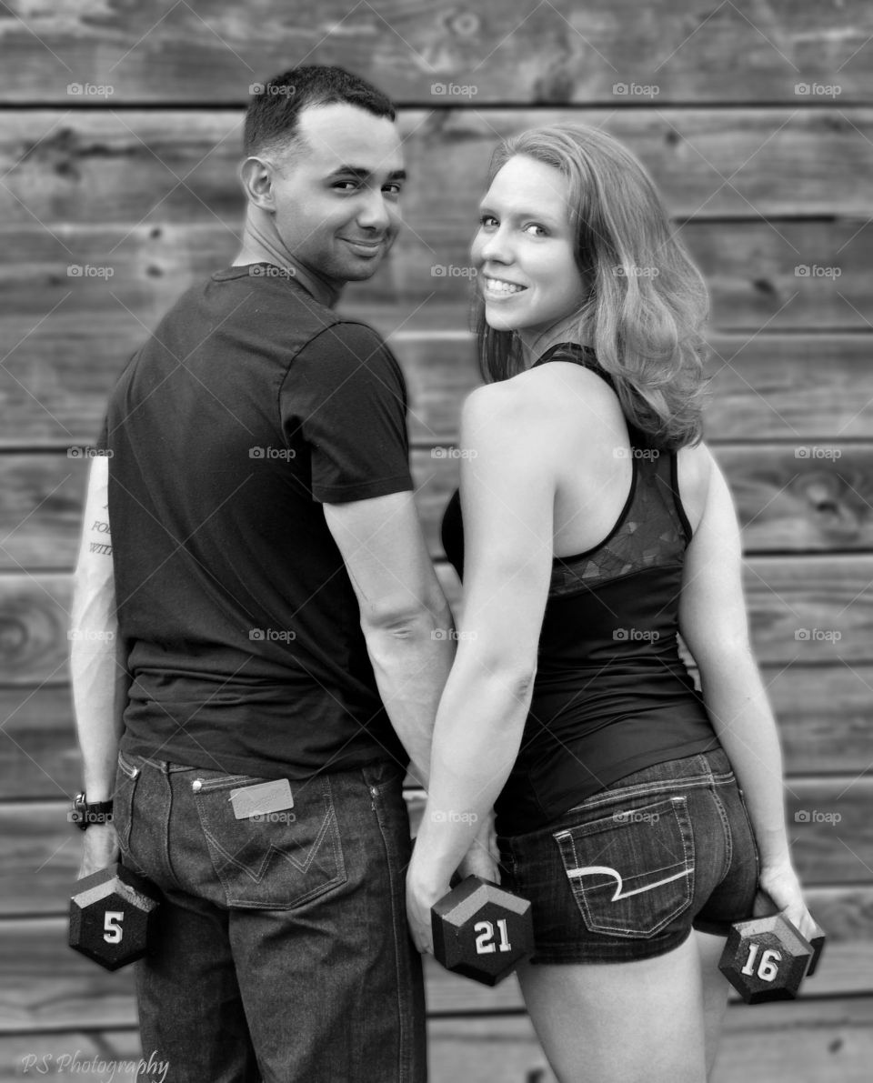 Save the date. couple incorporated their love of fitness into their engagement shoot