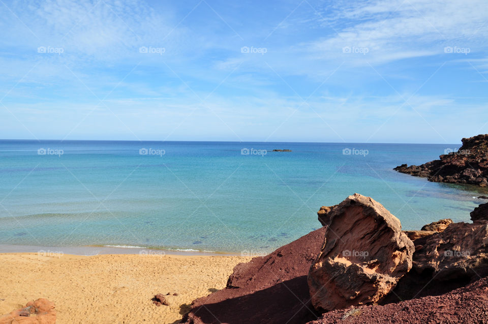 rocks on the beach of menorca Balearic island in Spain