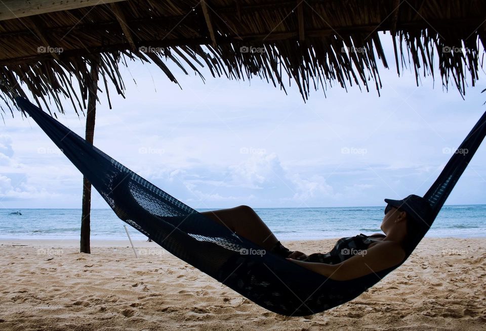 Woman relaxing on the beach