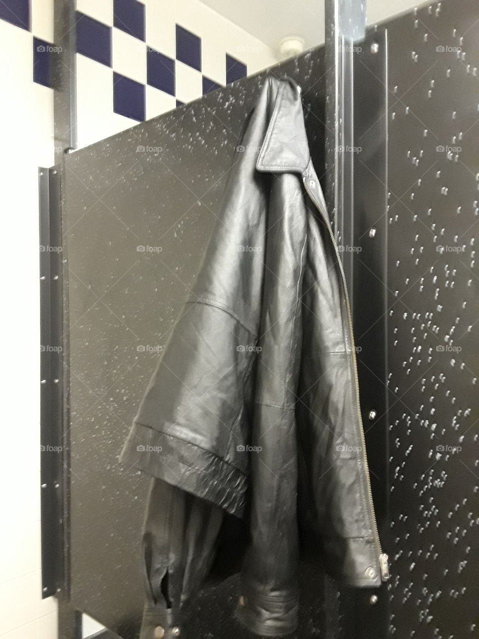 bathroom door leather coat