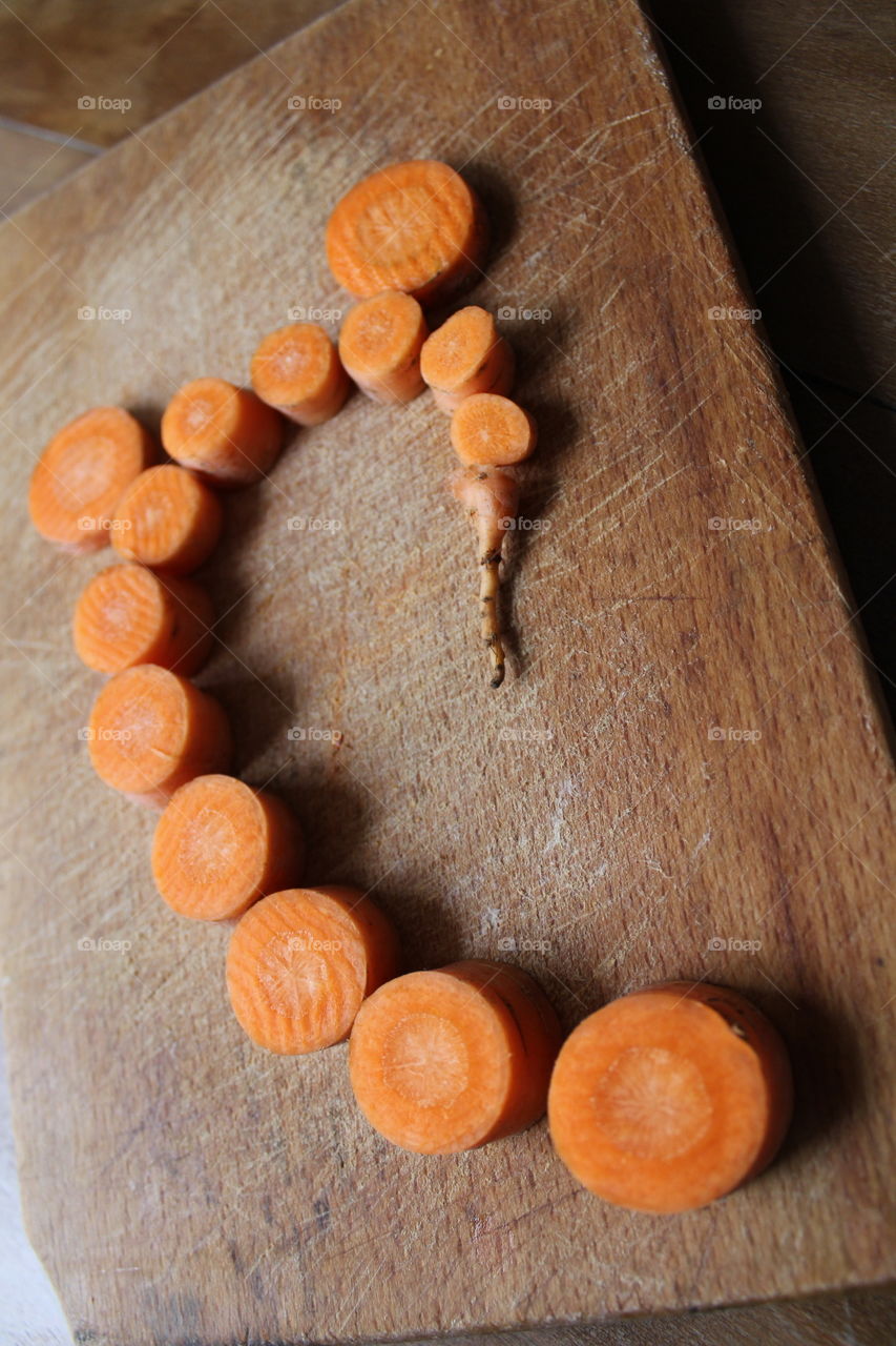 carrots cut on wooden table