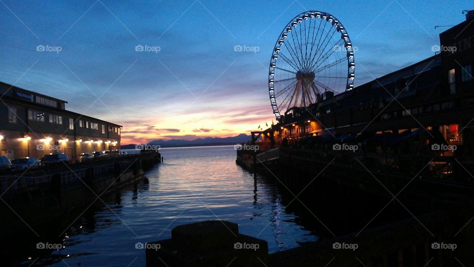 Seattle docks at twilight . Took a quick pic of the Pacific Ocean looking west from downtown 