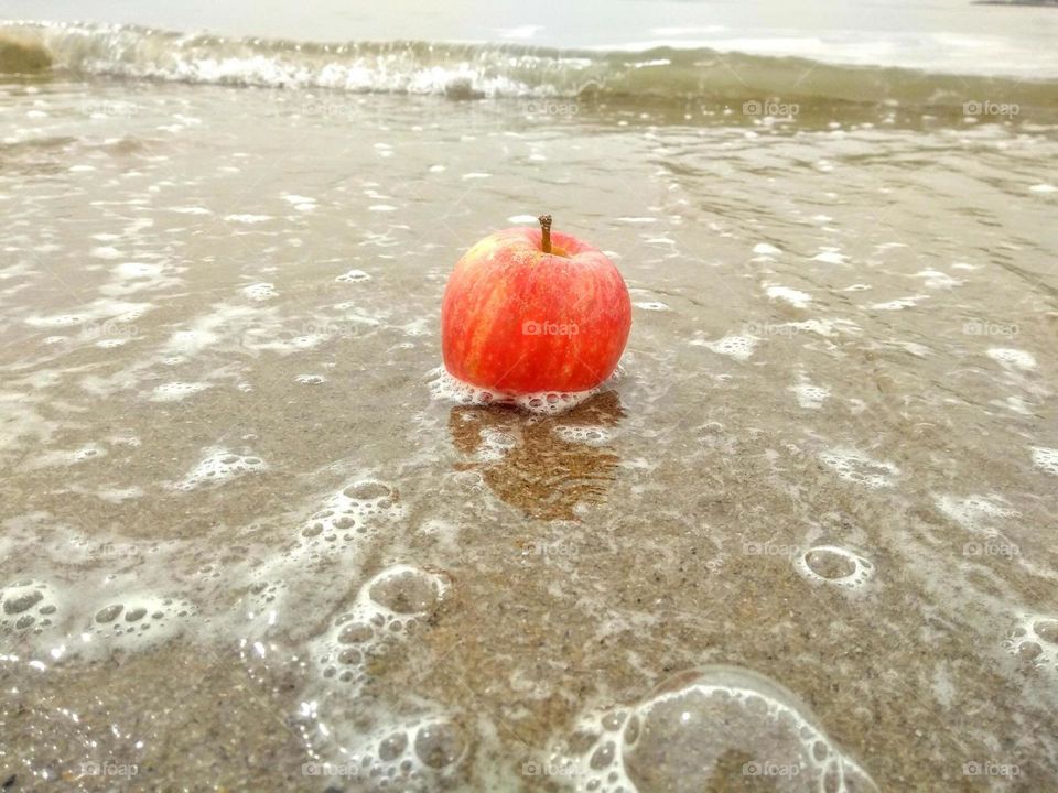 Apple on the beach