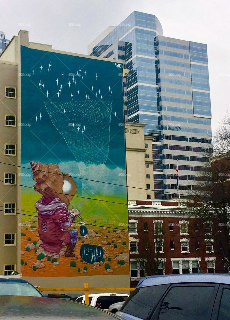 Brightening up the Portland sky line. Murals are my favorite thing to search for in all cities. 