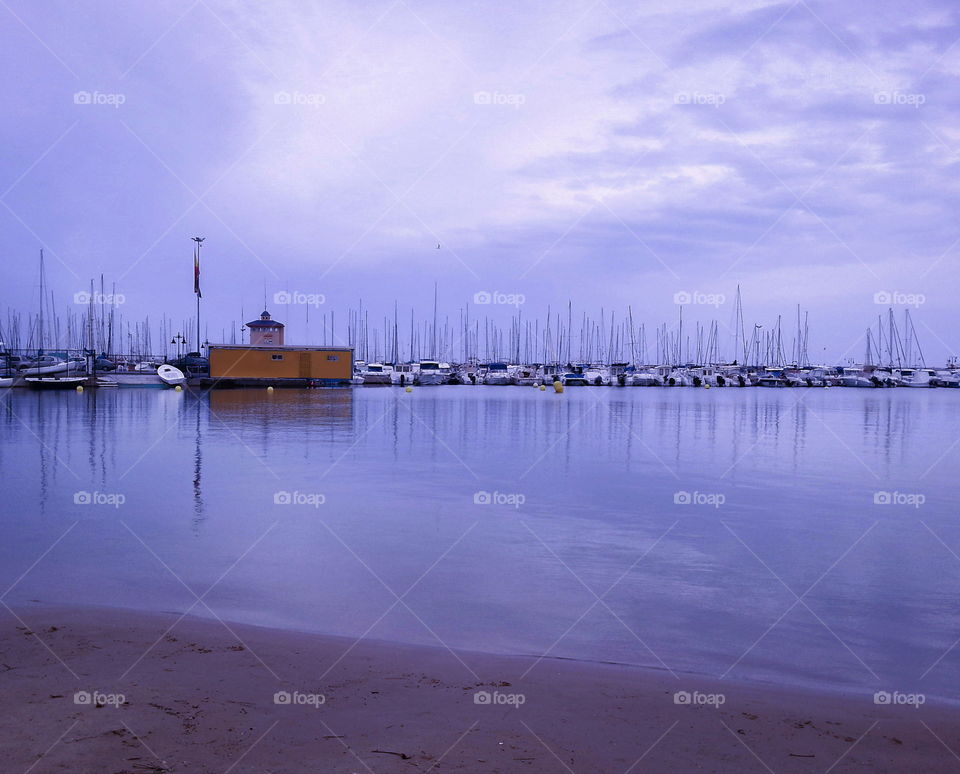 A Mediterranean  harbour in twilight