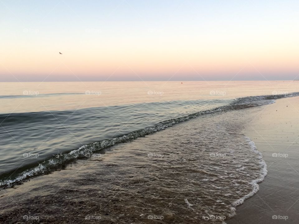 Sea waves on a seashore