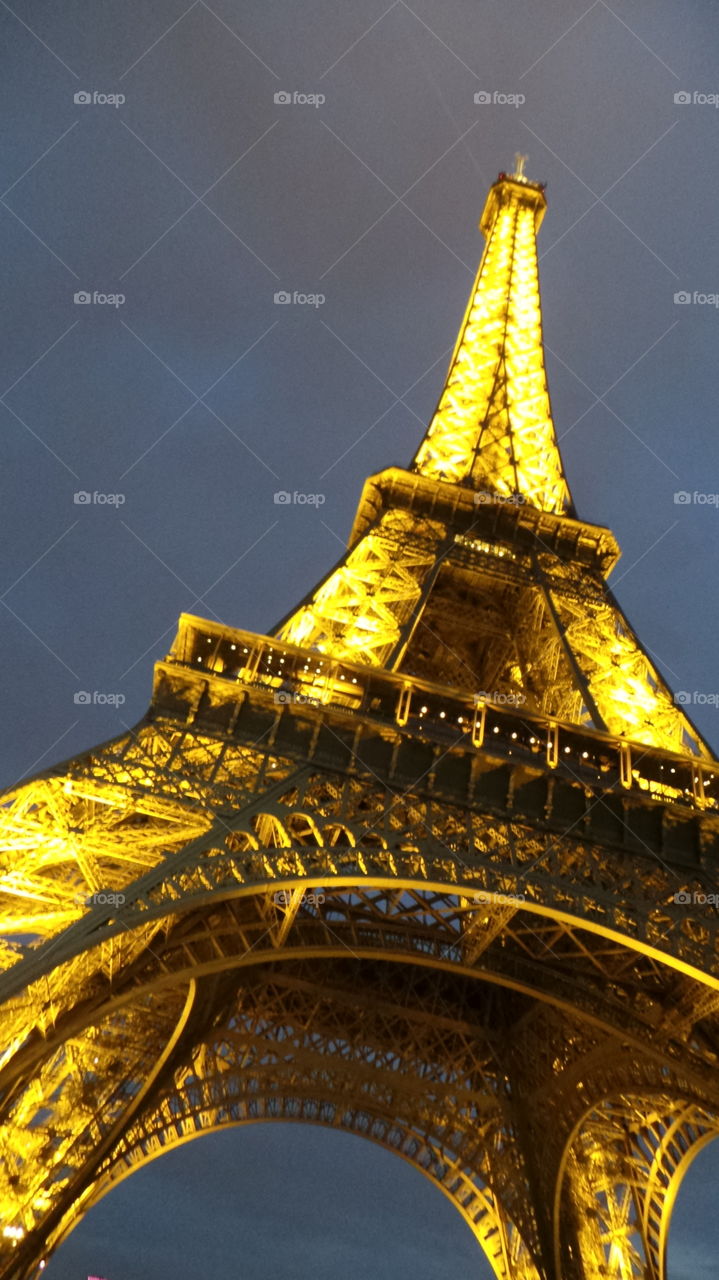 close up on the illuminated eiffle tower. france