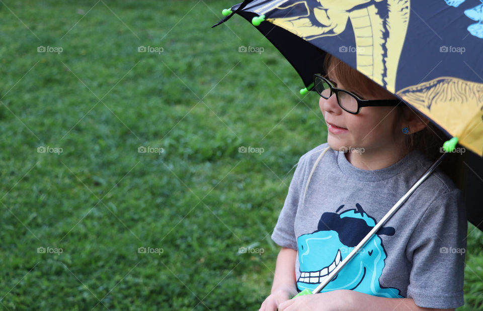 child with umbrella