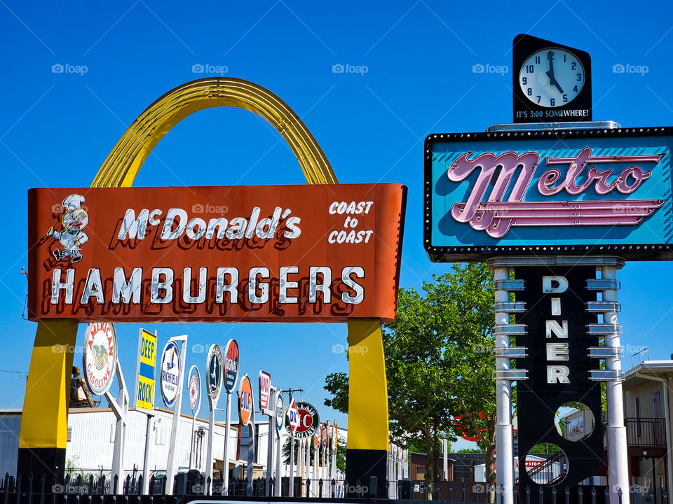 Classic American signs now rest at a sign museum and event center