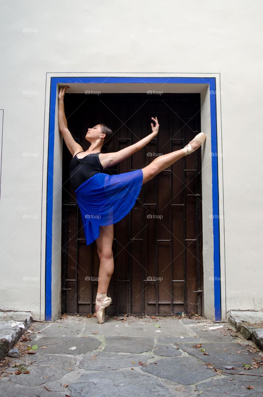 Young Female Ballerina Dancing Outside