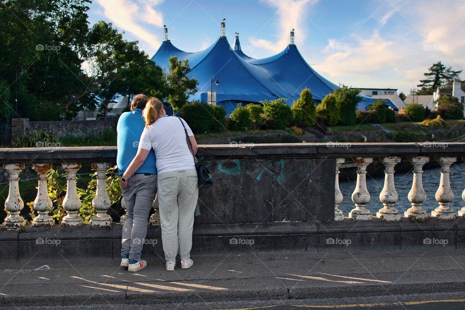 Summer love, couple on the bridge in Galway city, Ireland