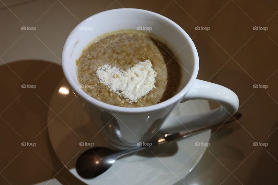 coffee with milk and oatmeal shot photo 
