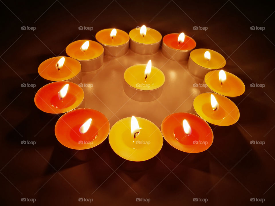 Tealight candles with blurred dark background