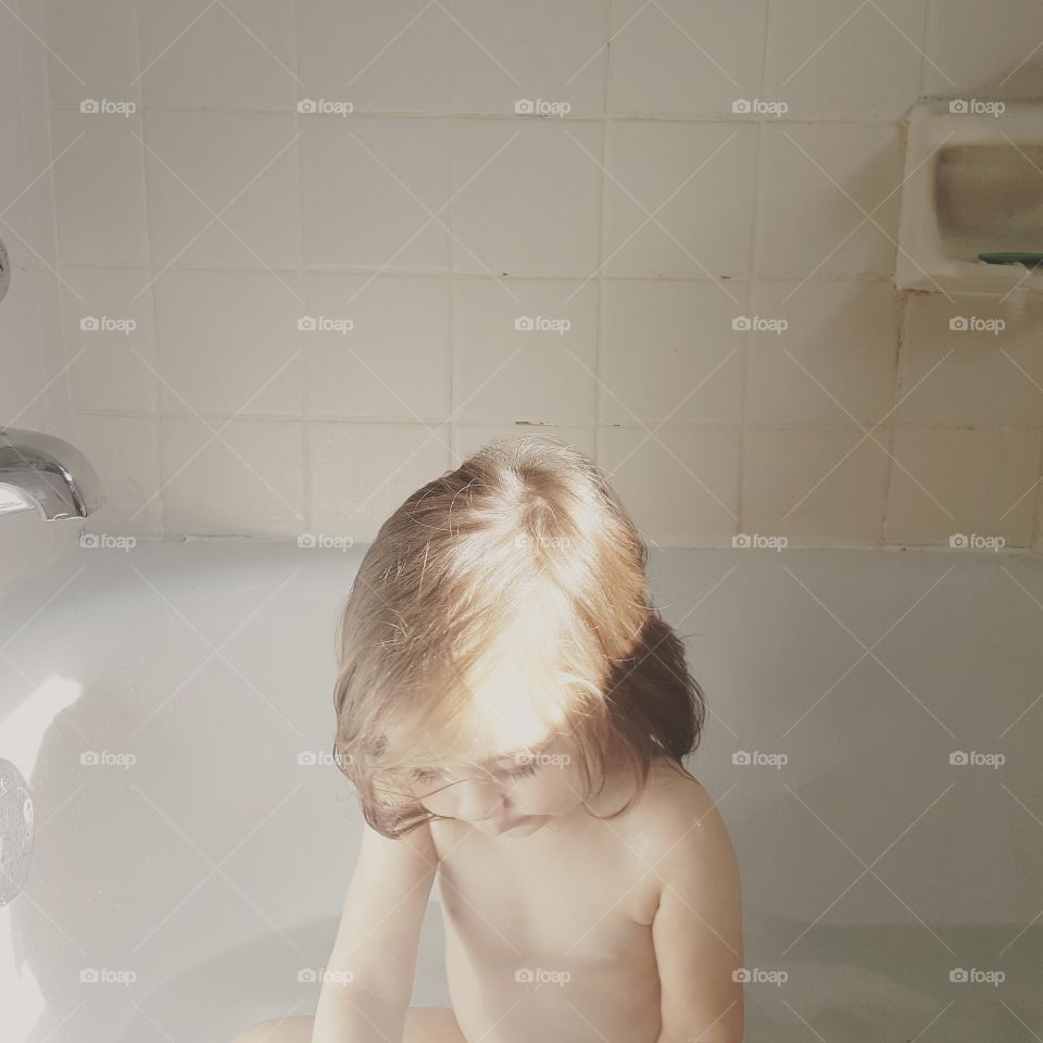 child in bath.