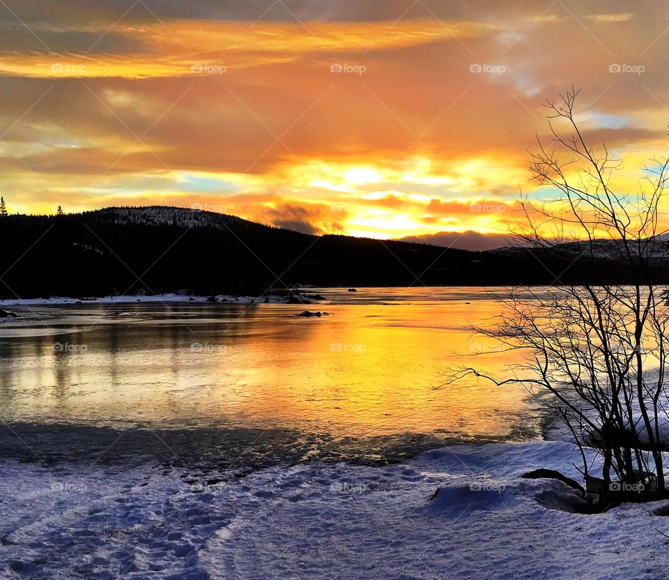 Sunset on winter lake