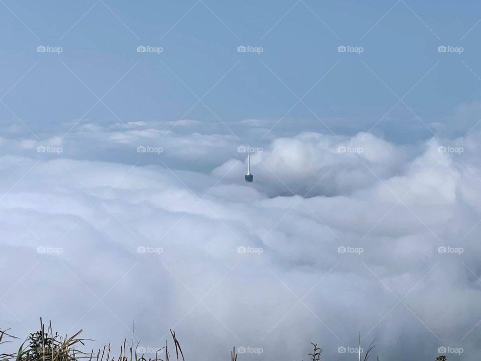 surrounded by clouds