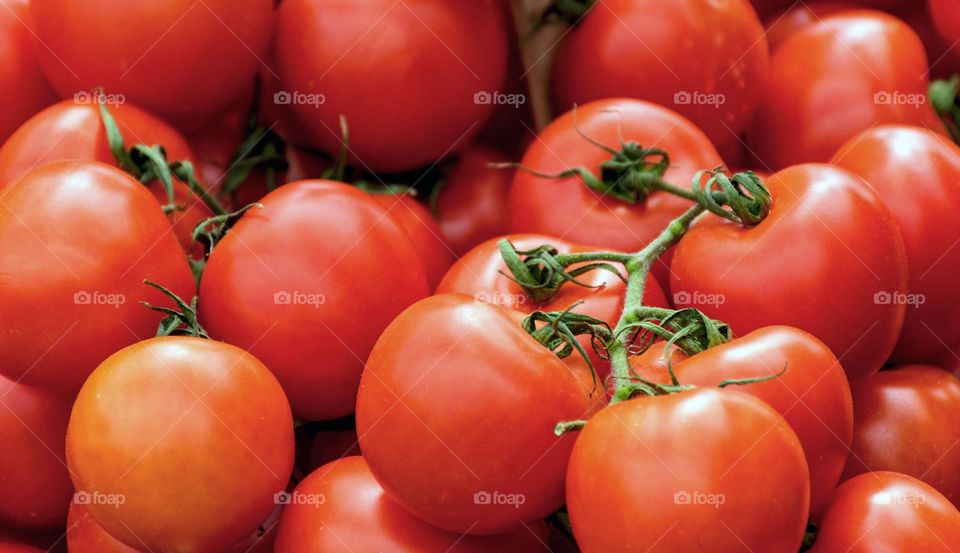 Close-up full frame photo of red tomatoes for sale on market