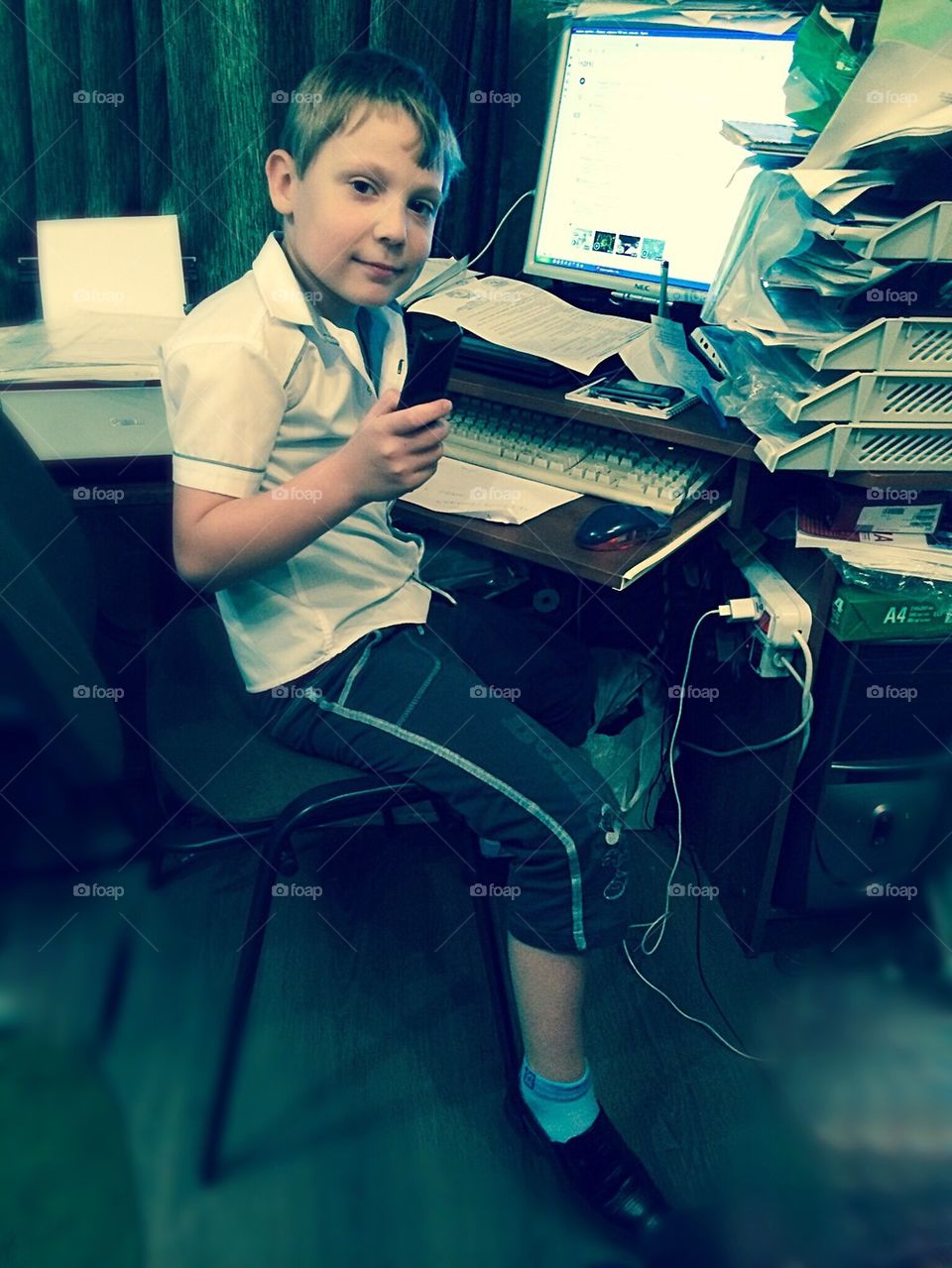 Boy busy at the computer