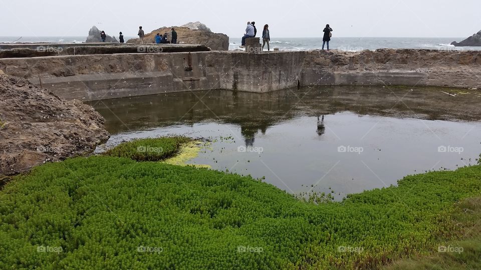 Visitor in the ruins of a bath in SanFrancisco