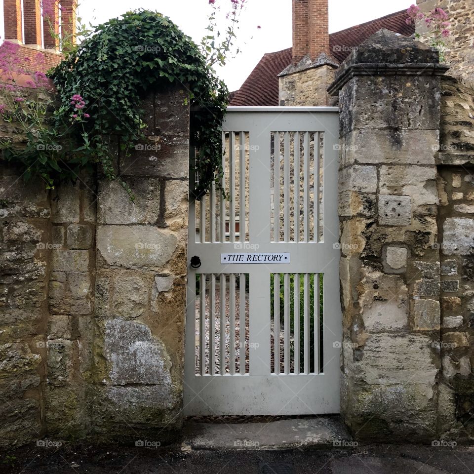 Old door way between two old stone walls 