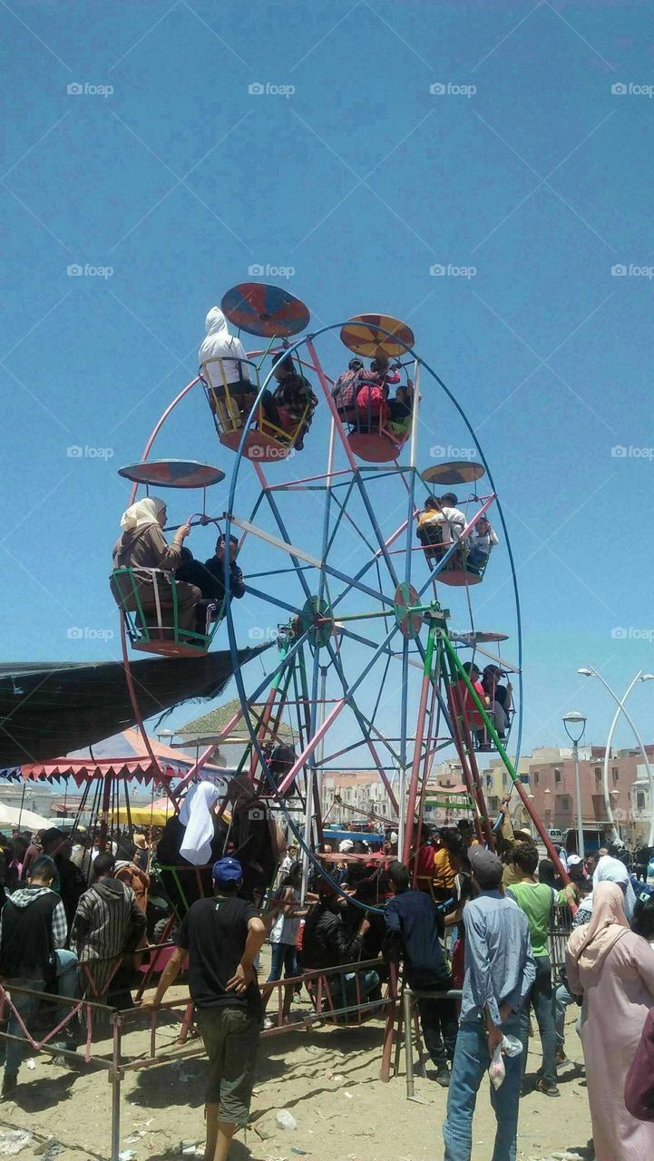 Beautiful wheel and nice moment of happiness in vacation.