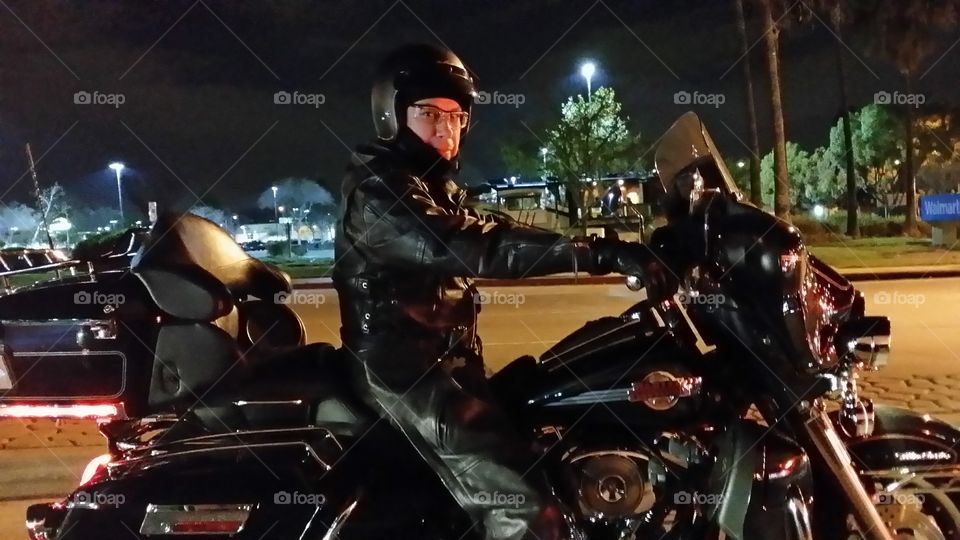 Harley Night Ride - California . Man riding Harley Davidson Ultra Glide at night in Southern California 