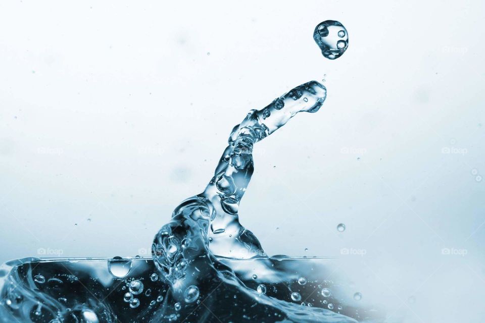 splash of water. freeze the water