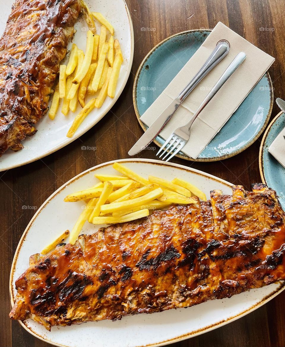 Grilled ribs with French fries 