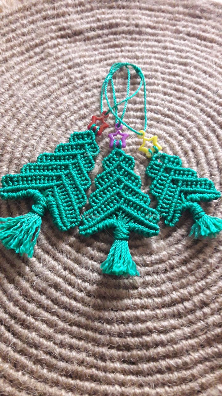 I weave decorations for the New Year holiday, macrame, Christmas trees,