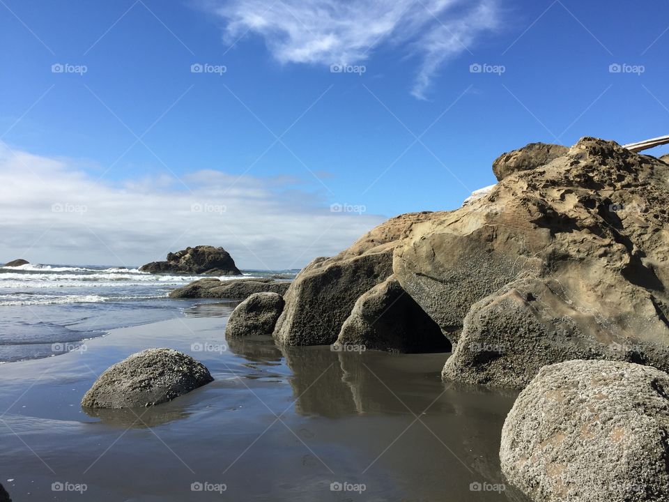 Scenic view of rocks on beach