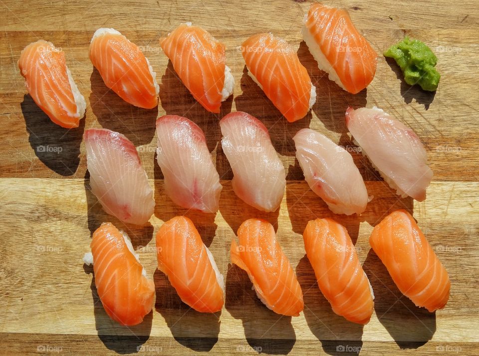 Fresh Sushi. Display Of Fresh Salmon And Tuna Sushi
