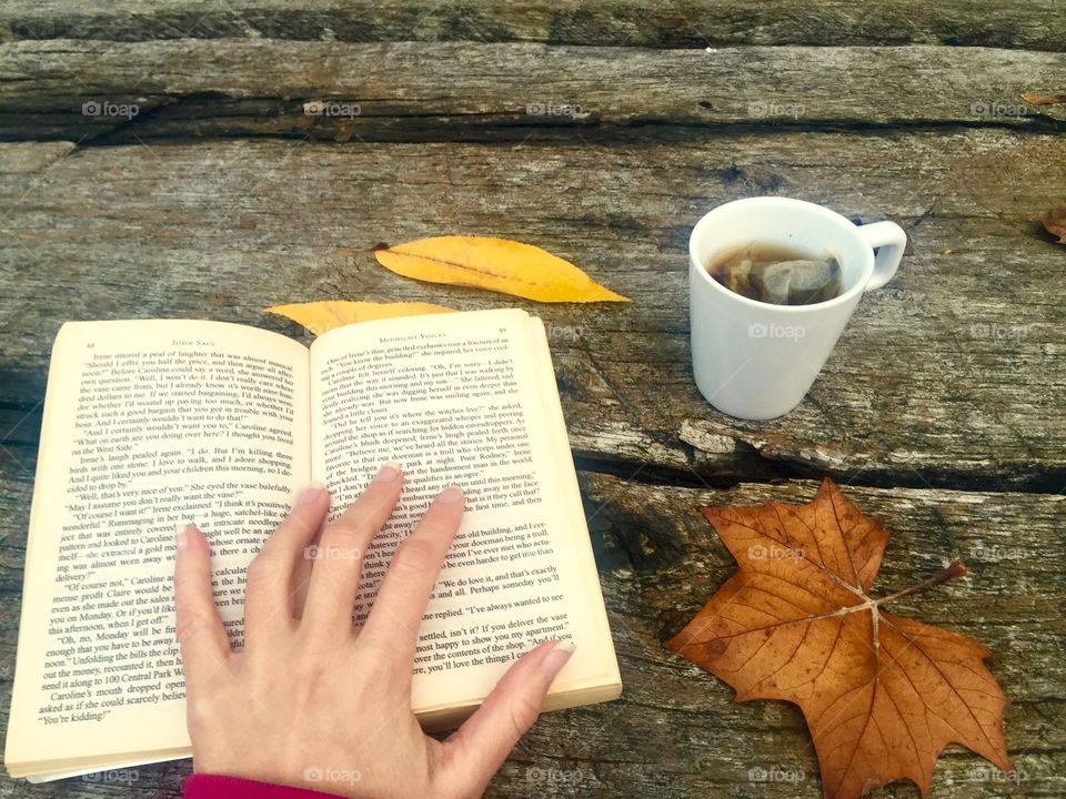 Cup of hot tea in autumn